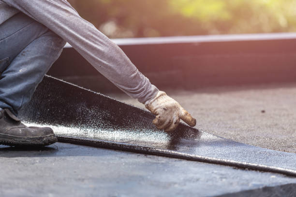 Professional Basement Waterproofing technician working in White House, TN
